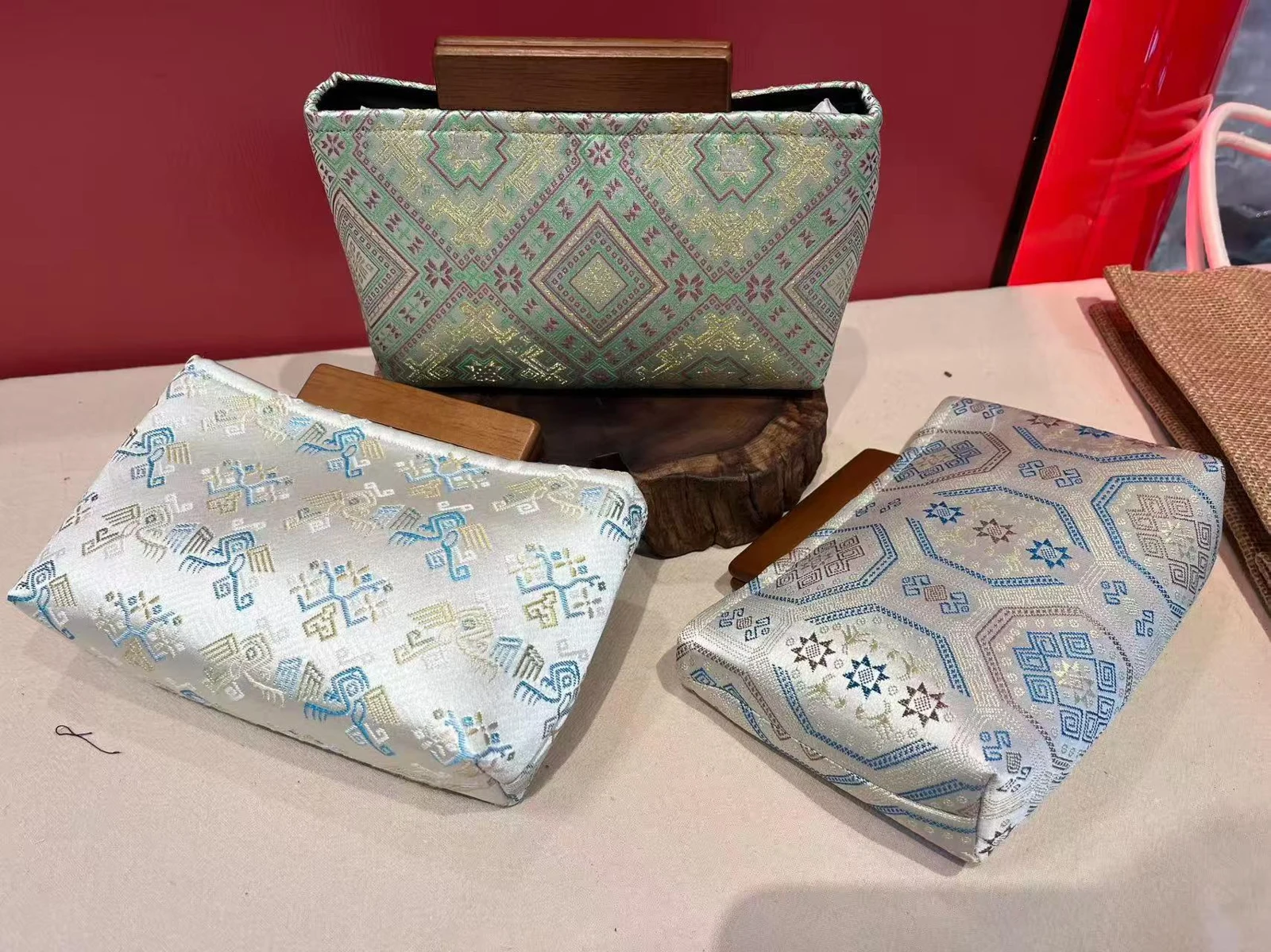 Sage Wood-Clasp Clutch — Supplier photograph