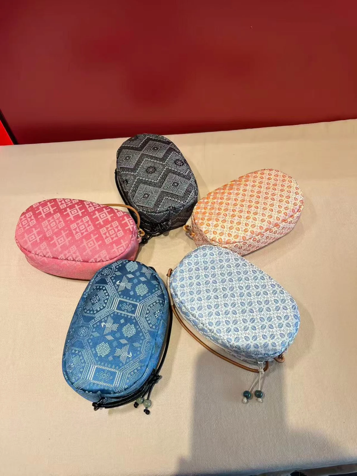 Rounded Brocade Crossbody — Supplier photograph